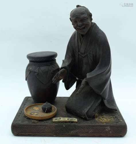 AN EARLY 20TH CENTURY JAPANESE MEIJI PERIOD CARVED WOOD OKIM...