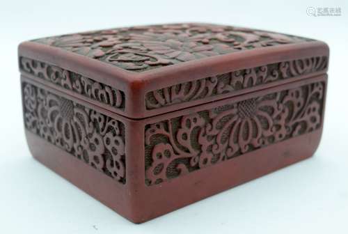 A 19TH CENTURY JAPANESE MEIJI PERIOD RED LACQUER BOX AND COV...