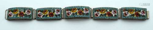 AN EARLY 20TH CENTURY ITALIAN WHITE METAL MOSAIC FLORAL BRAC...