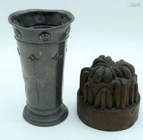 AN ARTS AND CRAFTS HAMPDEN PEWTER VASE decorated with floral...