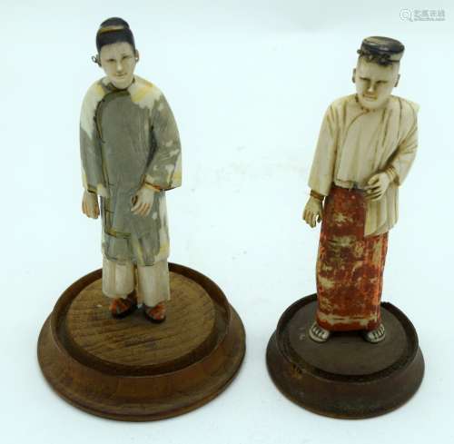 A PAIR OF 19TH CENTURY SOUTH EAST ASIAN POLYCHROMED IVORY FI...
