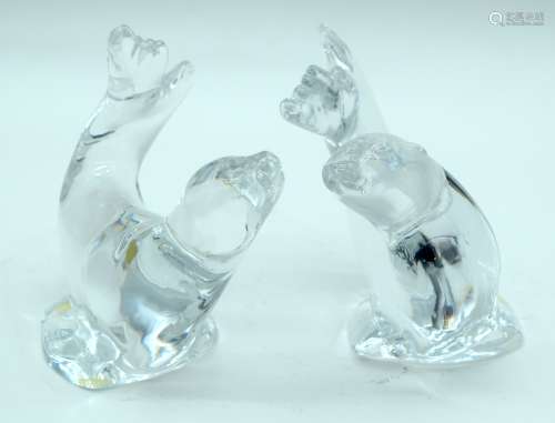 A PAIR OF SWEDISH LIMITED EDITION KOSTA BODA GLASS SEALS. 12...