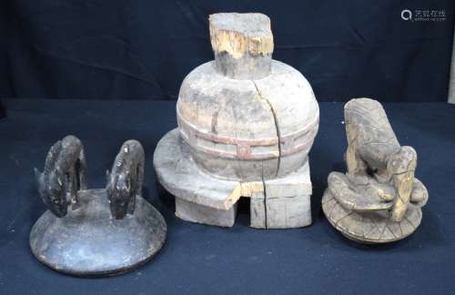 THREE AFRICAN TRIBAL CARVED WOOD COVERS OR LIDS in various f...