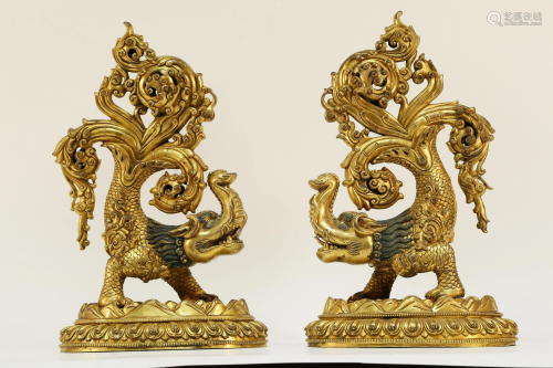 Two Tibetan Gilt Bronze Fortune Creatures