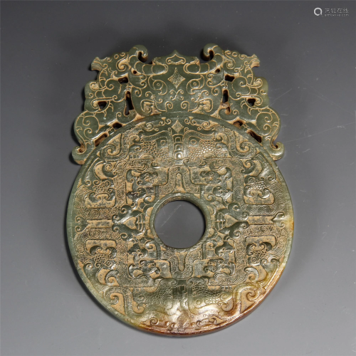 A CHINESE JADE CARVING BI