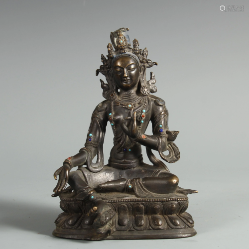 A CHINESE BRONZE FIGURE OF BUDDHA WITH HARDSTONES