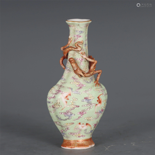 A CHINESE FAMILLE ROSE COILED-DRAGON PORCELAIN VASE