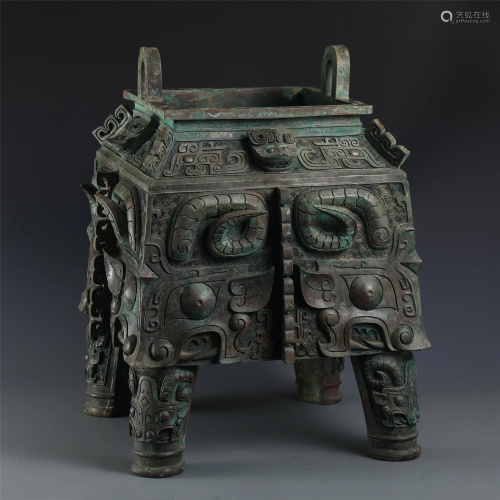 A CHINESE FOUR-FOOTED BRONZE SQUARE RITUAL VESSEL