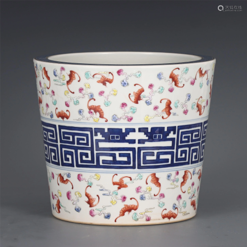 A CHINESE FAMILLE ROSE BLUE AND WHITE PORCELAIN FLOWER