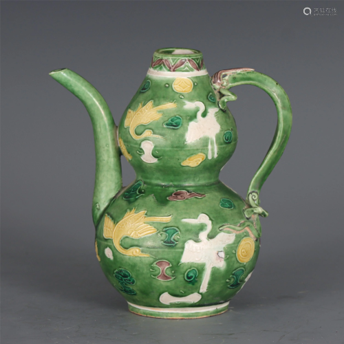 A CHINESE PLAIN TRICOLOR DOUBLE-GOURD POTTERY WINE-POT