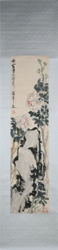 A CHINESE SCROLL PAINTING OF FLOWERS BLOSSOMMING