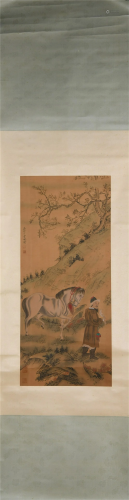 A CHINESE SCROLL PAINTING OF FIGURE AND HORSE