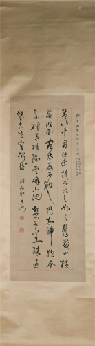 A CHINESE SCROLL PAINTING OF CALLIGRAPHY ON PAPER