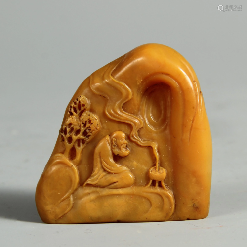 A CHINESE SOAPSTONE SEAL WITH FIGURE CARVINGS