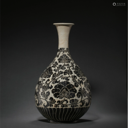 JIN DYNASTY, CHINESE CIZHOU WARE ENGRAVED FLOWER