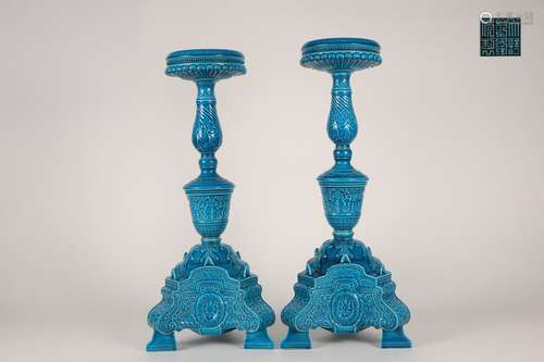 A Pair of Peacock Green Glazed Candlesticks