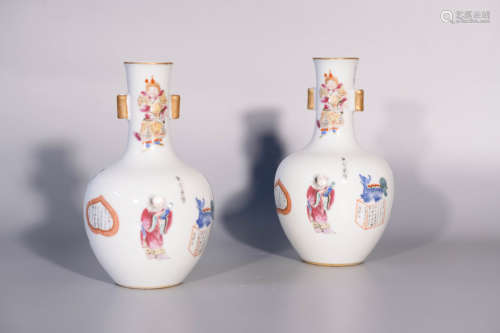 Qing dynasty, DAO GUANG, a pair of famille rose porcelain va...