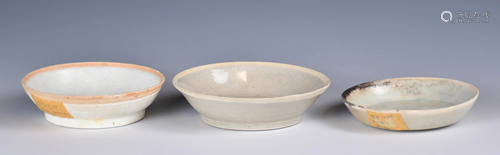 A Group Of White Glaze Dishes