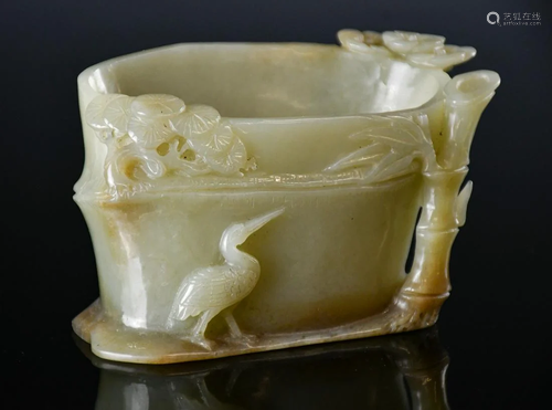 A Celadon Jade Flower Holder Qing