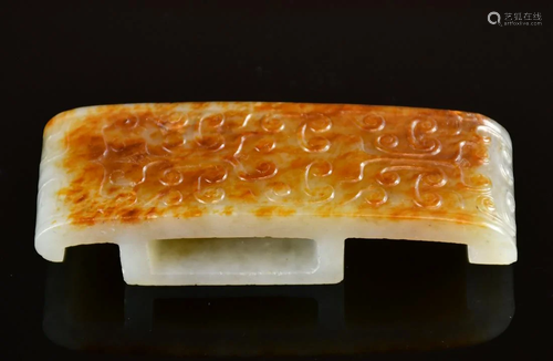 An Archaistic White Jade Scabbard Slide