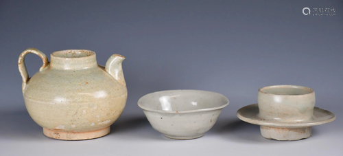 A Group Of Pottery Drinking Utensils