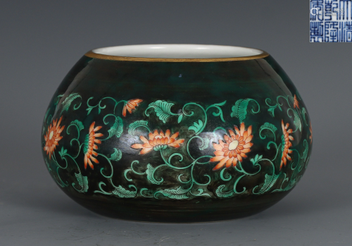A Black Ground Red and Green Enameled Waterpot