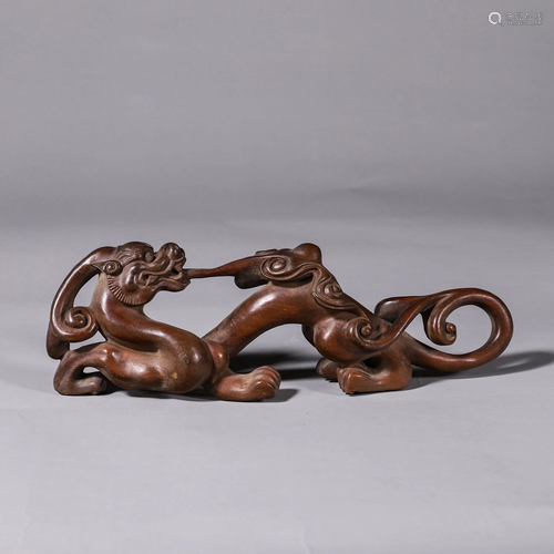 A Carved Wooden Brushrest