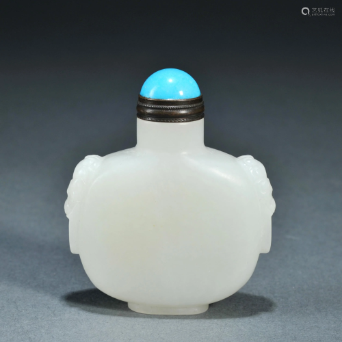 A Carved White Jade Snuff Bottle