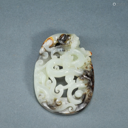 A White and Russet Jade Chilong Plaque