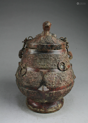 A Bronze Jar With Lid