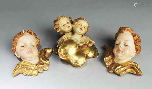 A Group Of Three Pottery Ornaments