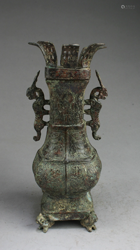 A Bronze Jar With Lid