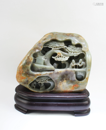 A Chinese Carved Jade Figurine