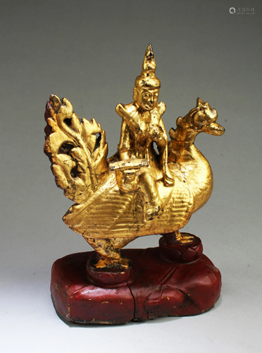 A Gilt Wooden Buddha Figurine