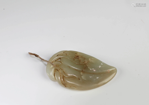 A Carved Jade Pendant