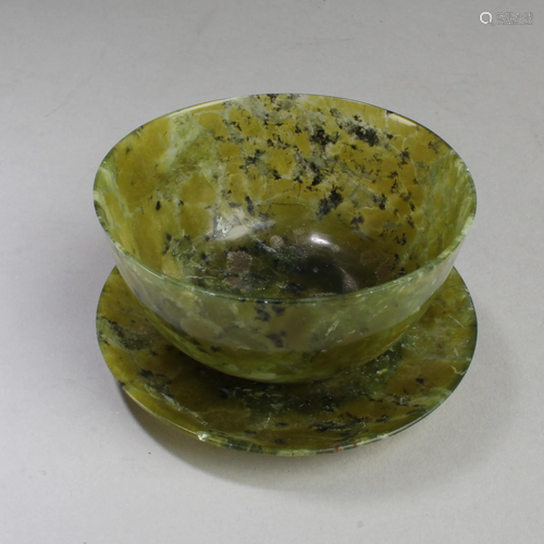 A Jadestone Cup with Saucer