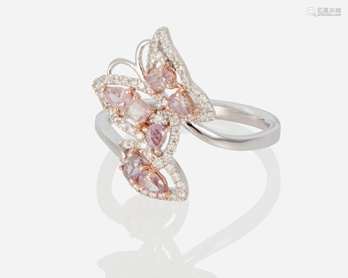 A pink colored and near colorless diamond butterfly