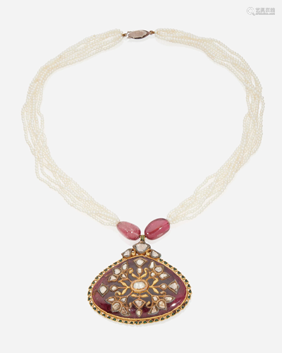 A carved rubellite and diamond pendant necklace