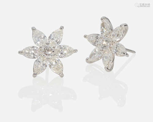 A pair of diamond flower earrings