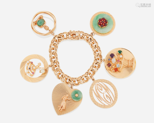 A gold and gemstone charm bracelet