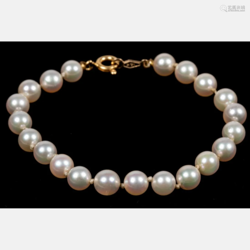 A 14kt Yellow Gold and Cultured Pearl Bracelet,