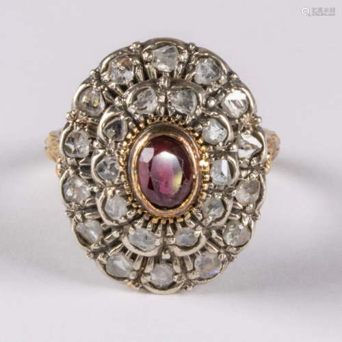 An 18kt Yellow and White Gold Diamond and Ruby Ring,