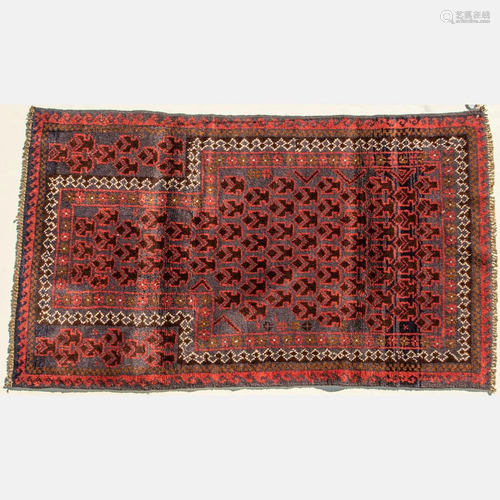 An Afghani Baluch Wool Rug, 20th Century.