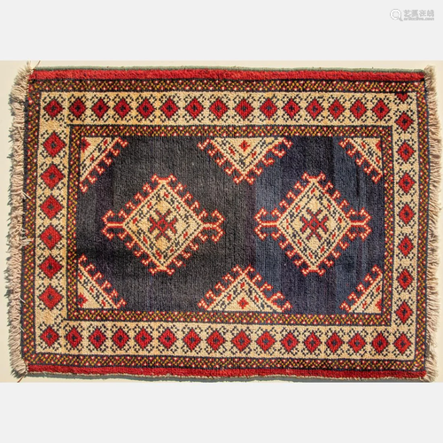 A Persian Ardebil Wool Rug, 20th Century.