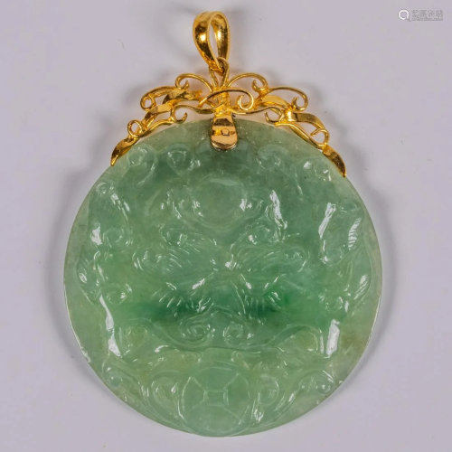 A Chinese Carved Celedon Jade Pendant Depicting a