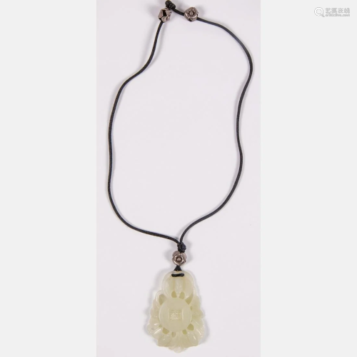 A Chinese Carved White Jade Pendant,