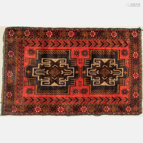 An Afghani Turkoman Wool Rug, 20th Century.