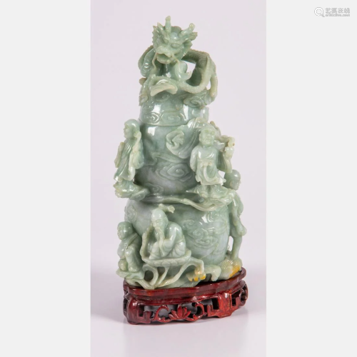 A Chinese Carved Jade Lidded Figural Vessel Depicting