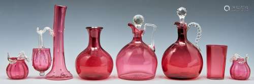 A cranberry glass spill vase and hanging basket and several ...