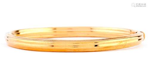 A gold bangle, 68mm, marked 9kt, 12g Good condition